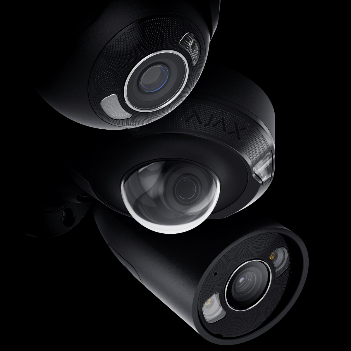 FB-LI-1 Forskellige sorte AJAX videoovervågningskameraer med objektiver og lys mod mørk baggrund.